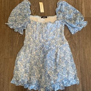 Light blue and white floral romper